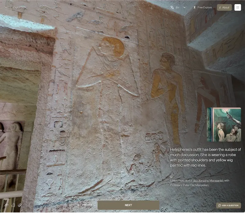 A still photo from the Tomb of Queen Meresankh III virtual exhibit, displaying a portion of the tomb wall with hieroglyphs.