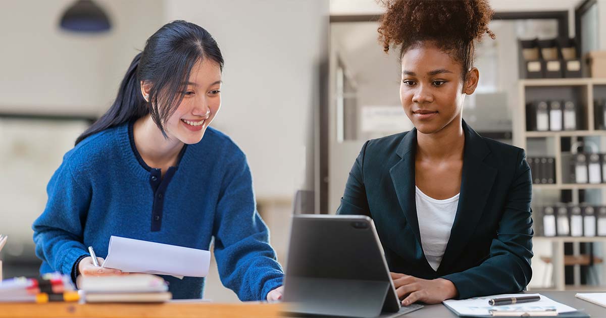 A split screen of two museum professionals working together from different locations.