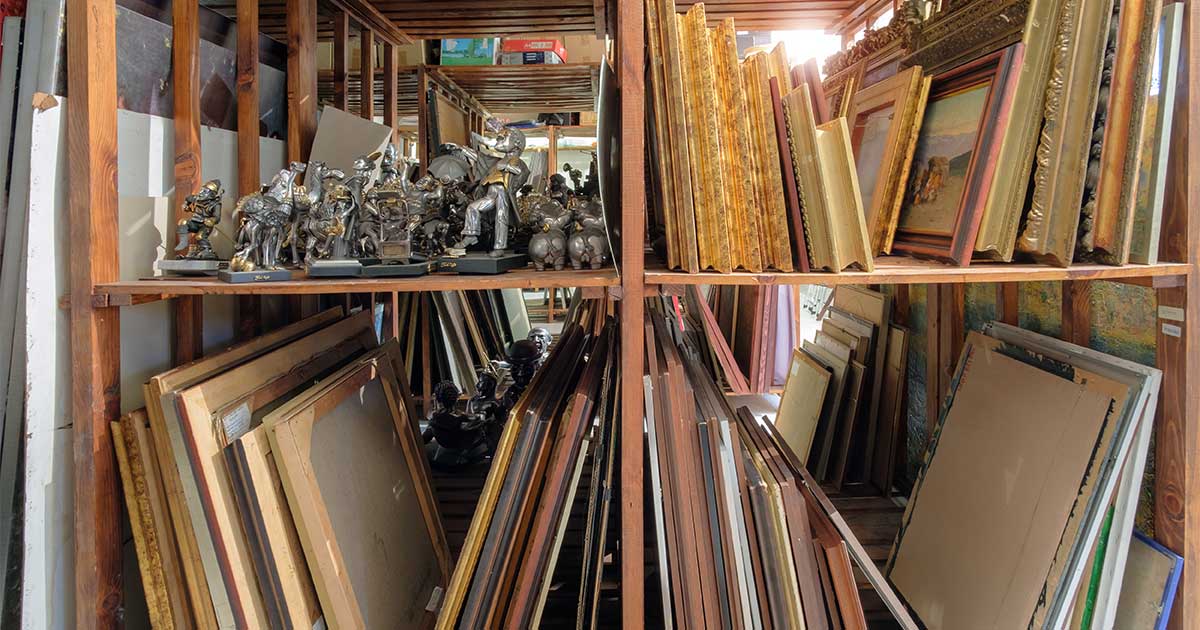 A shelf filled with archival materials, representing a physical corporate archives.